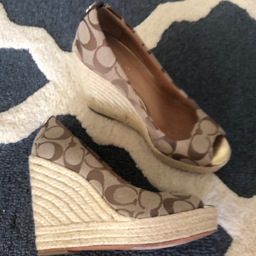 Coach wedges size 5.5. Worn a few times. In excellent condition.